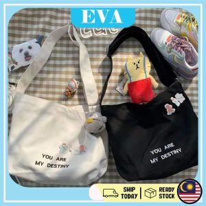 READY STOCK EVA Large-capacity tote one-shoulder canvas bag female literary lazy style Korean wild ins student bag Bags Cartoon Pocket Zip Totebag Black Wanita